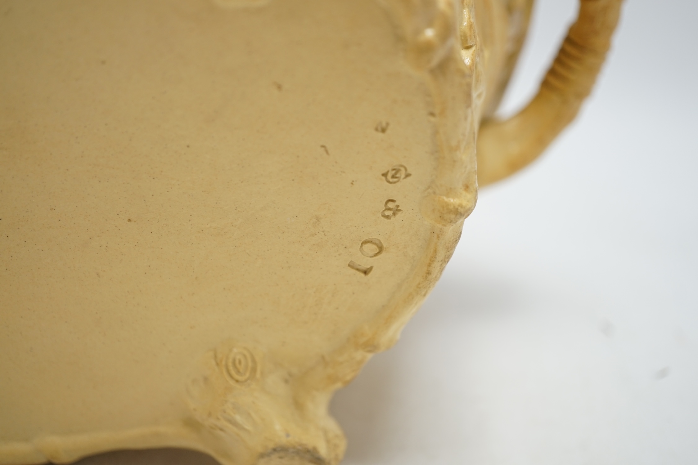 A 19th century Minton caneware game pie dish and cover, 33cm wide. Condition - acorn leaf tip and wing tip missing on cover, small chips to inner lip of tureen.